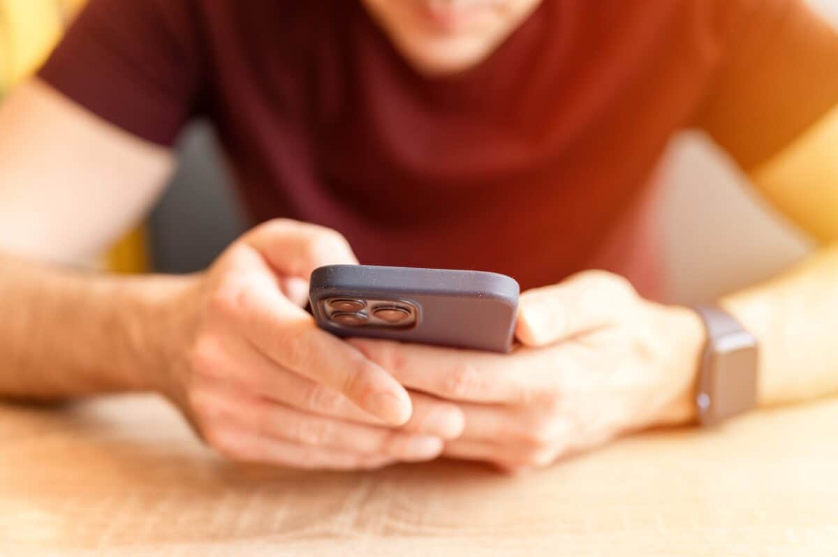 Man using iphone smartphone