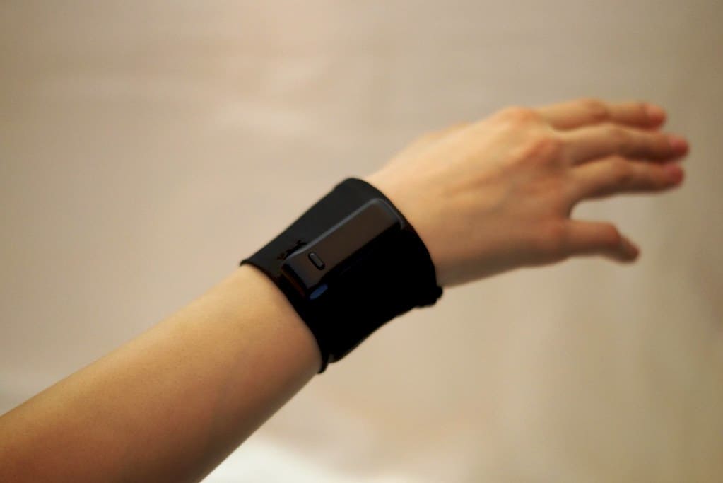 black fitbit ultra on a wrist