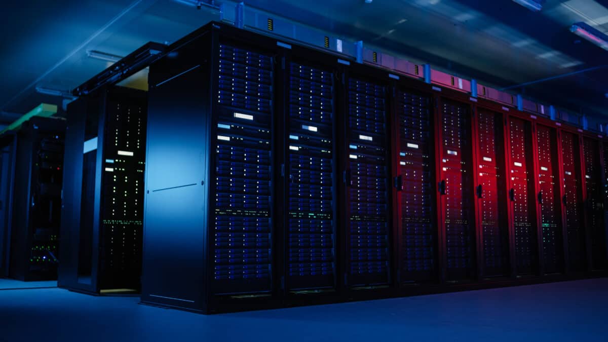 data center with rows of operational server racks.