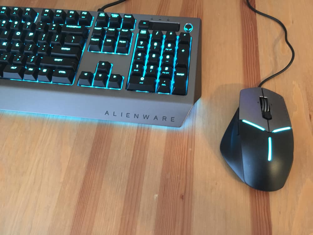 Dell alienware keyboard and mouse on a desk