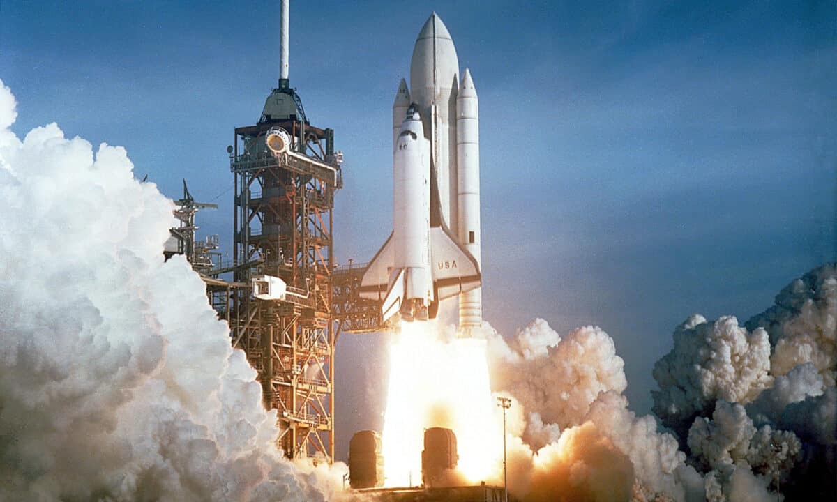 NASA rocket mid-launch.